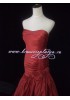 Длинное вечернее красное платье с цветком
